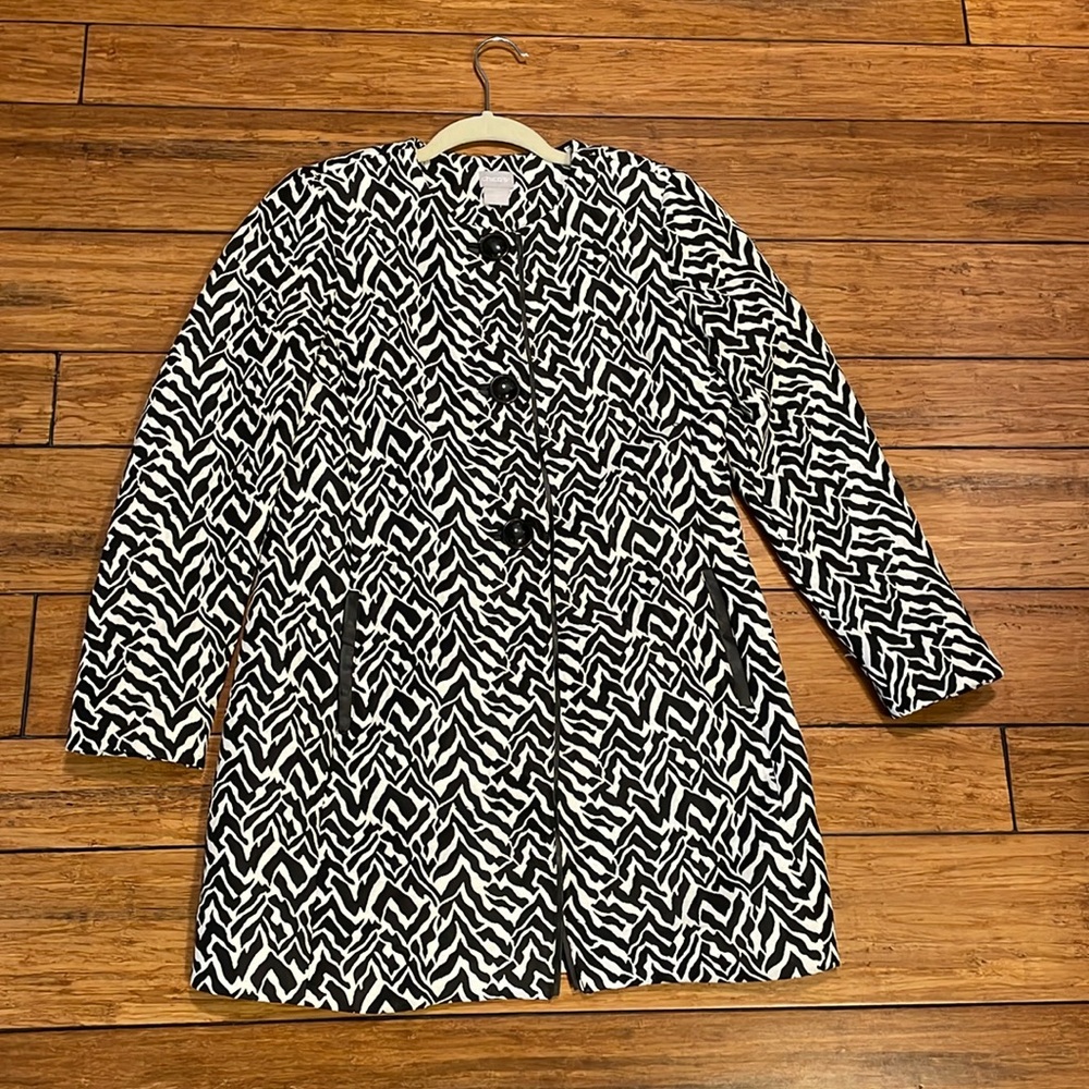 A black and white size 0 jacket medium length super comfortable